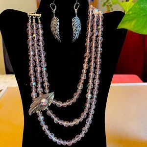 NWOT Crystal beads with metal embellishments.  Matching wire earrings